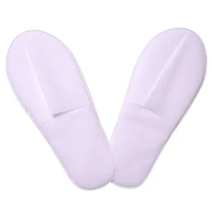 Kapcie jednorazowe kryte włókninowe pakowane pojedynczo 25 par QMS Line Extra do hotelu i SPA