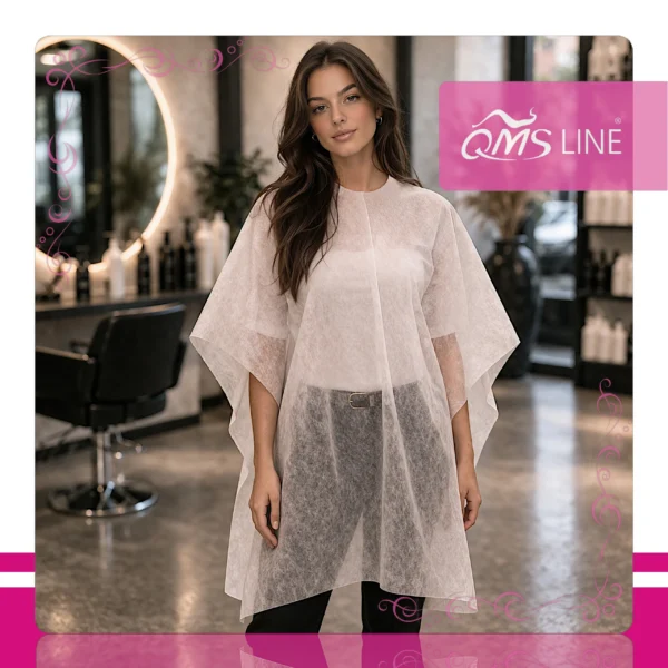 Pelerynka Fryzjerska Włókninowa Długa 25 szt. QMS Line Standard Pelerynka fryzjerska włókninowa długa 25 szt. QMS Line Standard do salonu fryzjerskiego