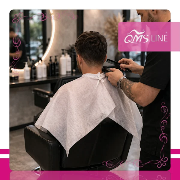Pelerynka Fryzjerska Włókninowa Długa 25 szt. QMS Line Standard Pelerynka fryzjerska włókninowa długa 25 szt. QMS Line Standard do salonu fryzjerskiego