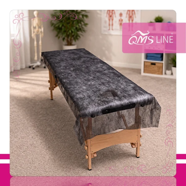 Podkład Kosmetyczny Jednorazowy z Włókniny Czarny 60 cm x 50 m QMS Line Standard Podkład kosmetyczny jednorazowy z włókniny czarny 60 cm x 50 m QMS Line Standard do salonu kosmetycznego