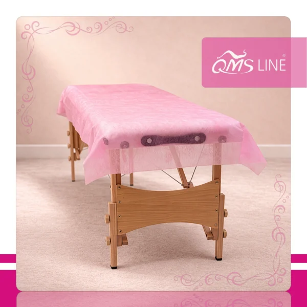 Podkład Kosmetyczny Jednorazowy z Włókniny Różowy 50 cm x 50 m QMS Line Standard Podkład kosmetyczny jednorazowy z włókniny różowy 50 cm x 50 m QMS Line Standard do salonu kosmetycznego