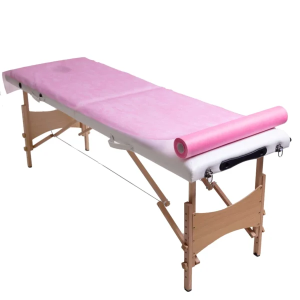 Podkład kosmetyczny jednorazowy z włókniny różowy 60 cm x 50 m QMS Line Standard do salonu kosmetycznego
