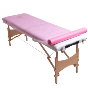 Podkład kosmetyczny jednorazowy z włókniny różowy 70 cm x 50 m QMS Line Standard do salonu kosmetycznego