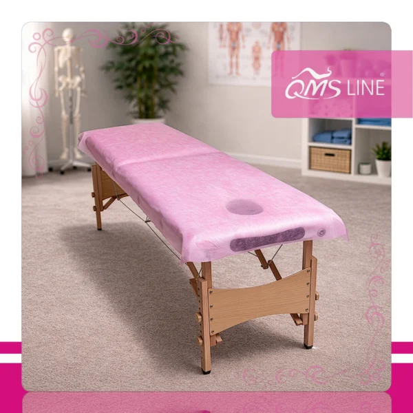 Podkład Kosmetyczny Jednorazowy z Włókniny Różowy 70 cm x 50 m QMS Line Standard Podkład kosmetyczny jednorazowy z włókniny różowy 70 cm x 50 m QMS Line Standard do salonu kosmetycznego