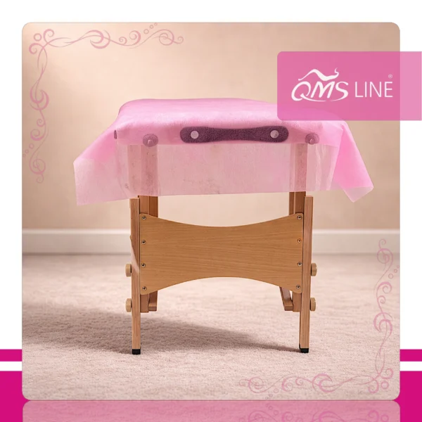 Podkład Kosmetyczny Jednorazowy z Włókniny Różowy 70 cm x 50 m QMS Line Standard Podkład kosmetyczny jednorazowy z włókniny różowy 70 cm x 50 m QMS Line Standard do salonu kosmetycznego