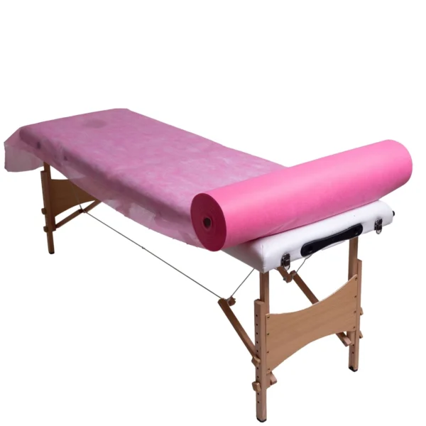 Podkład kosmetyczny jednorazowy z włókniny różowy 80 cm x 200 m QMS Line Standard do salonu kosmetycznego