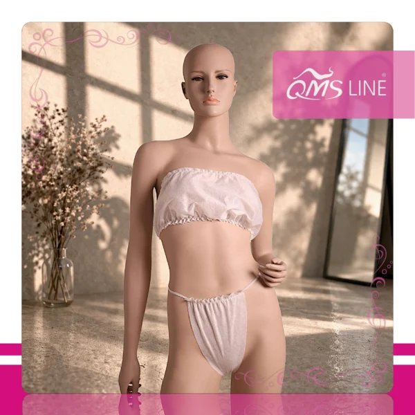 Stringi Włókninowe Jednorazowe Damskie L 10 szt. QMS Line Premium Stringi włókninowe jednorazowe damskie L pakowane pojedynczo 10 szt. QMS Line Premium do salonu kosmetycznego i SPA